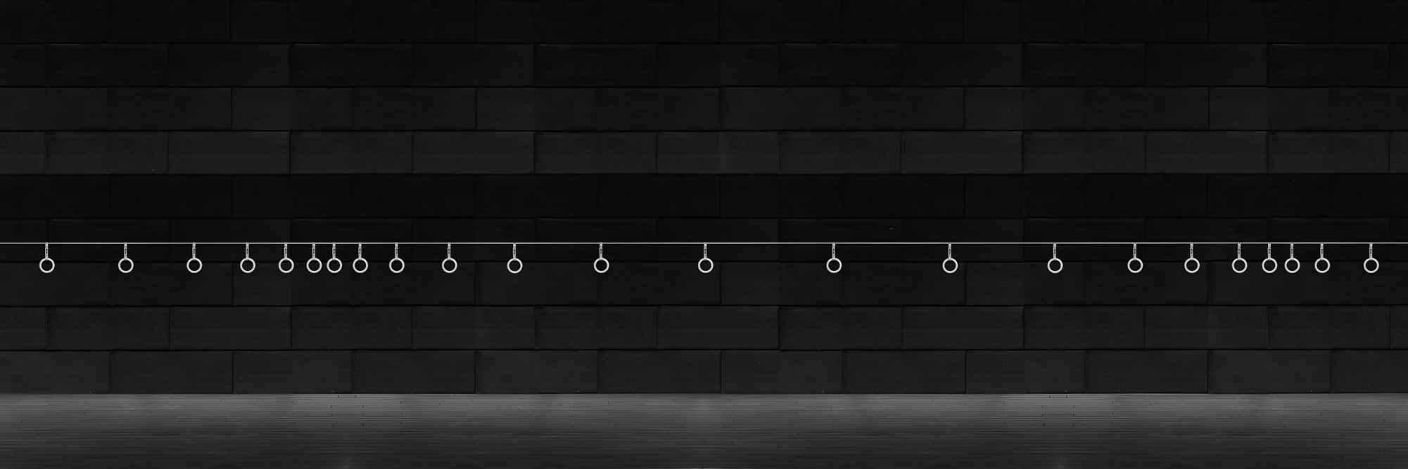 02.Modern times 2. HANGERS. 30 inch × 10 inch. Digital C - print. 2007