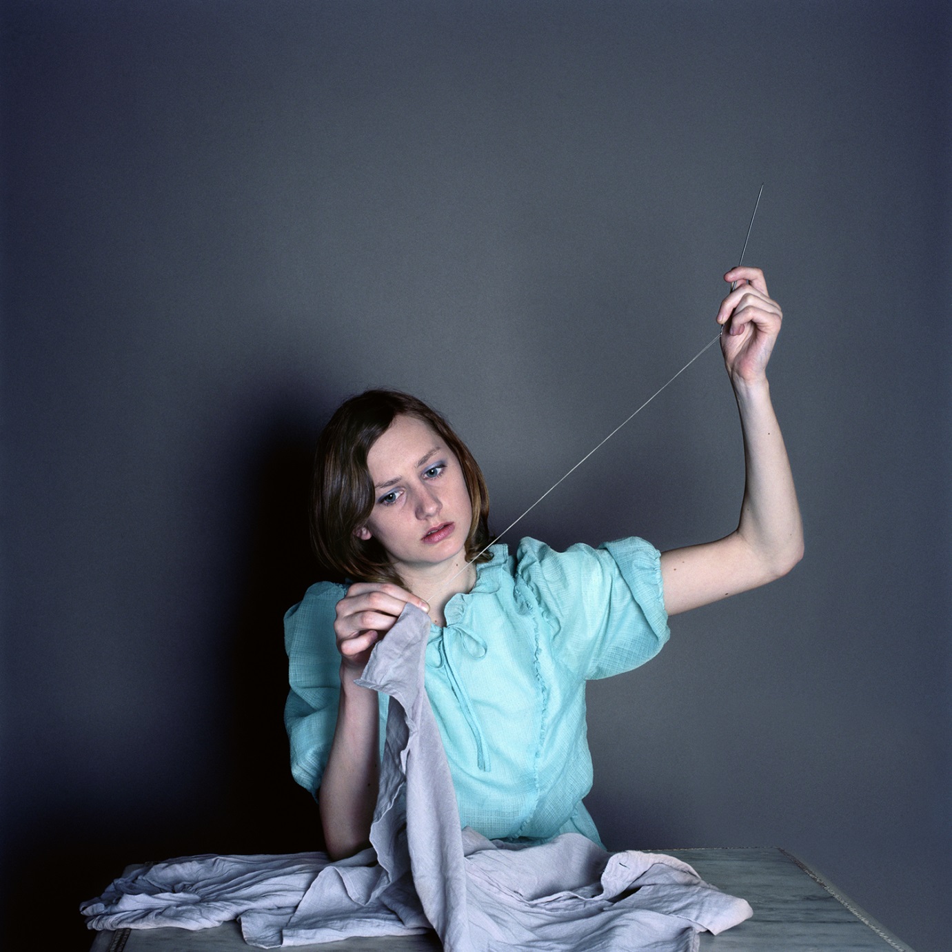 1. Woman Sewing, 2009, 100x100cm, Digital C-Print