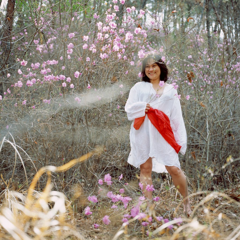 145 2005 A flower shakes Her